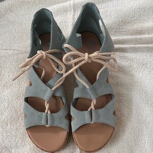 Sorel Women's Sandals in light blue with ankle strap/tie. Cork wedge 2.5” heel.